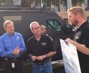 Presentation of $1000 Check
