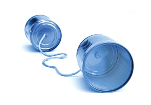 cans with rope tied to them like a phone